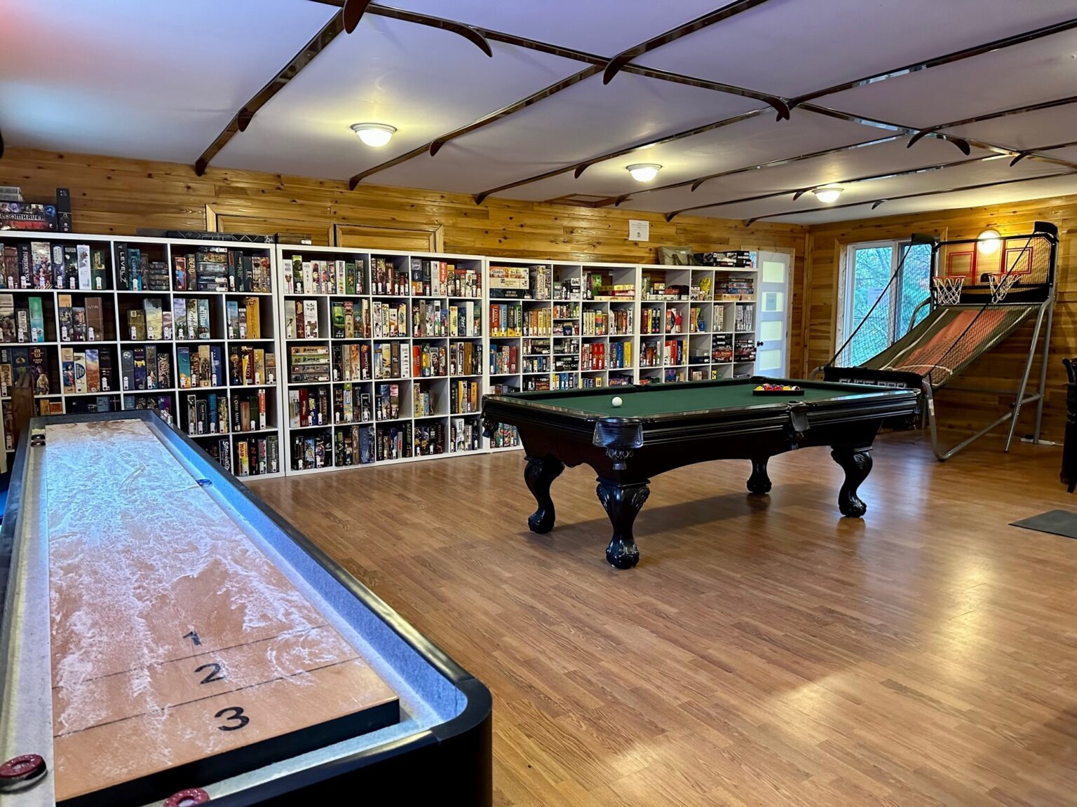 Games Galore : Our games room with over 500 board games, pool table, shuffle board, and arcade games